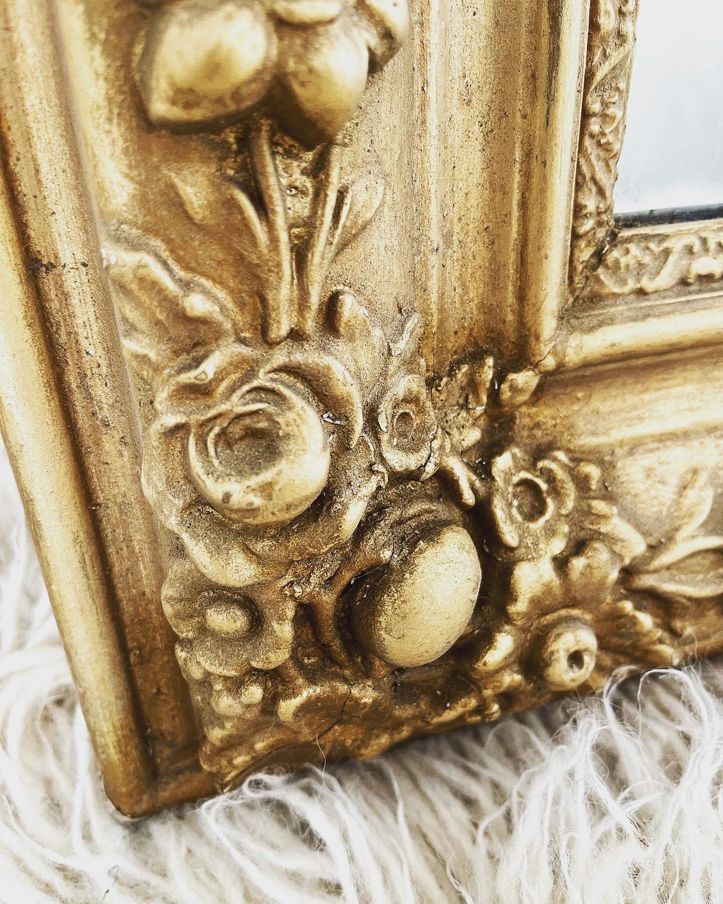 Antique gilded wooden mirror