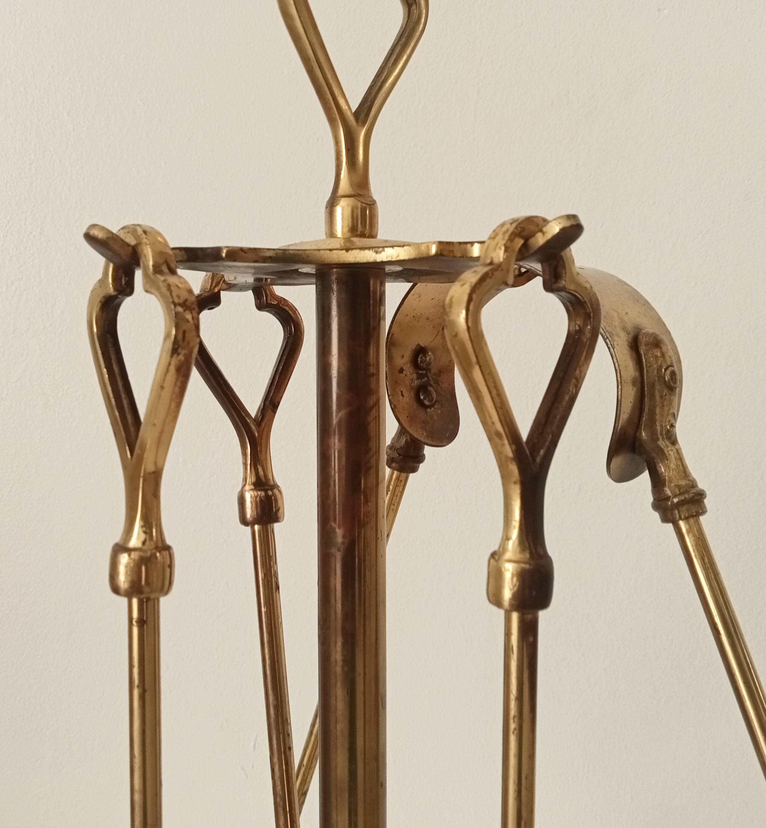 Old brass fireplace servant