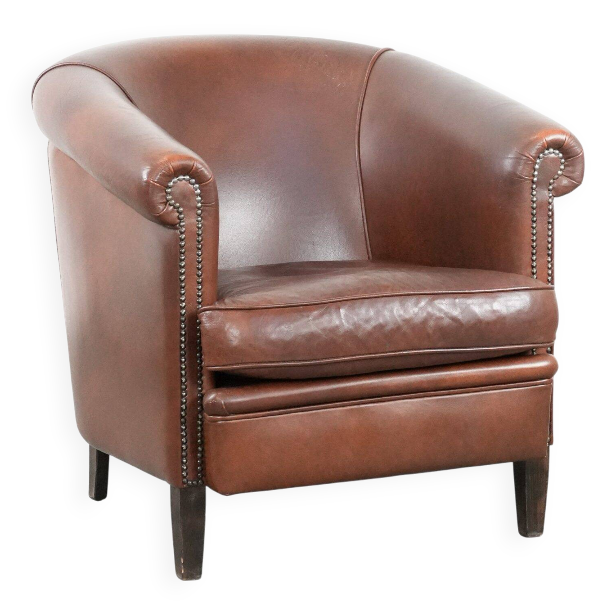 Cognac-coloured cow leather club armchair in English style
