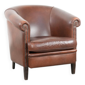 Cognac-coloured cow leather club armchair in English style