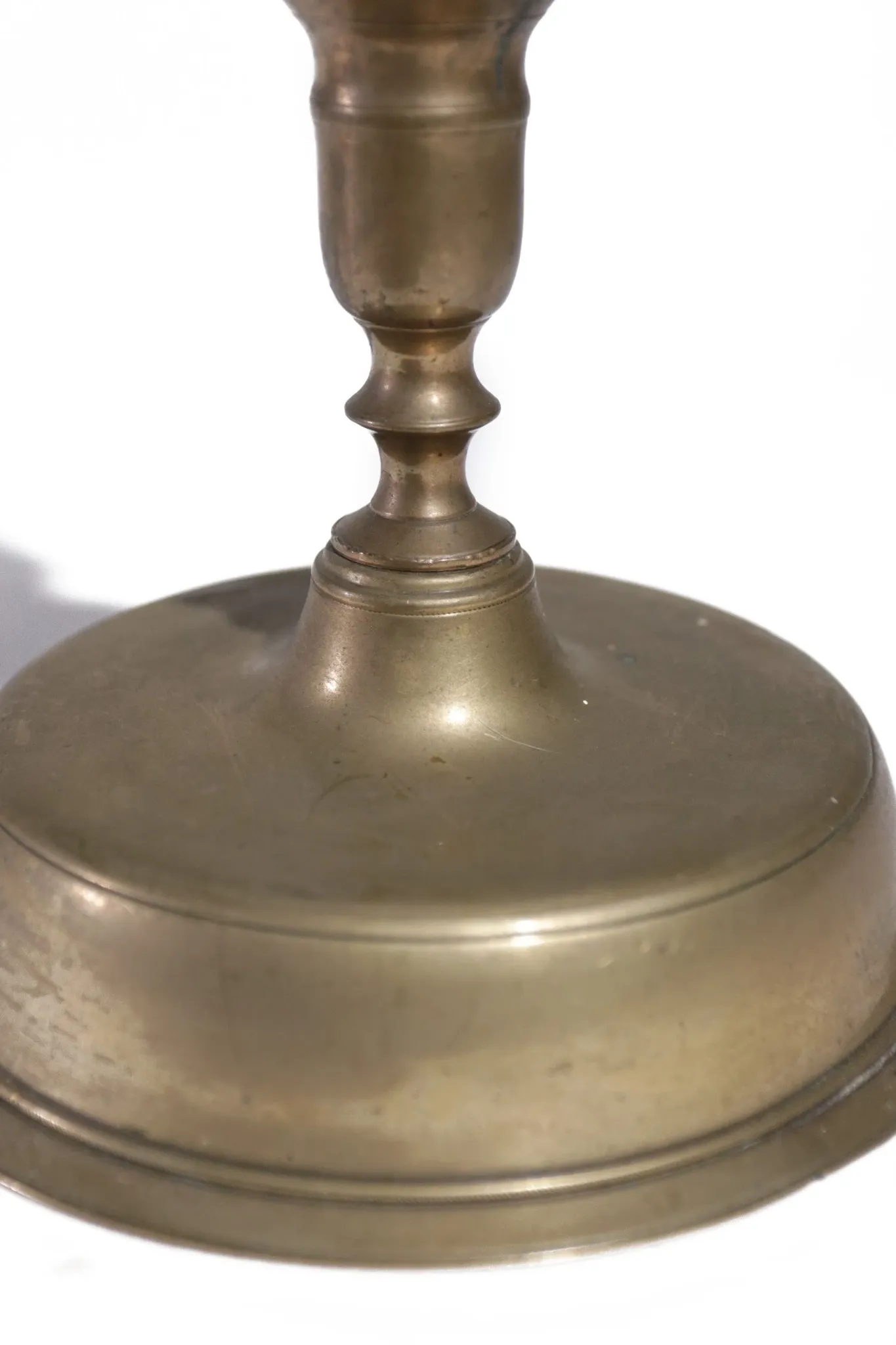 Large Spanish brass candlestick with low bell base – circa 1680-1730