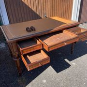 Double-sided flat desk in Louis XVI style made of mahogany and leather.