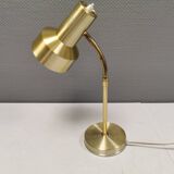 Older Swedish table lamp, estimated 1980s, in gold-colored aluminum with “bend”.