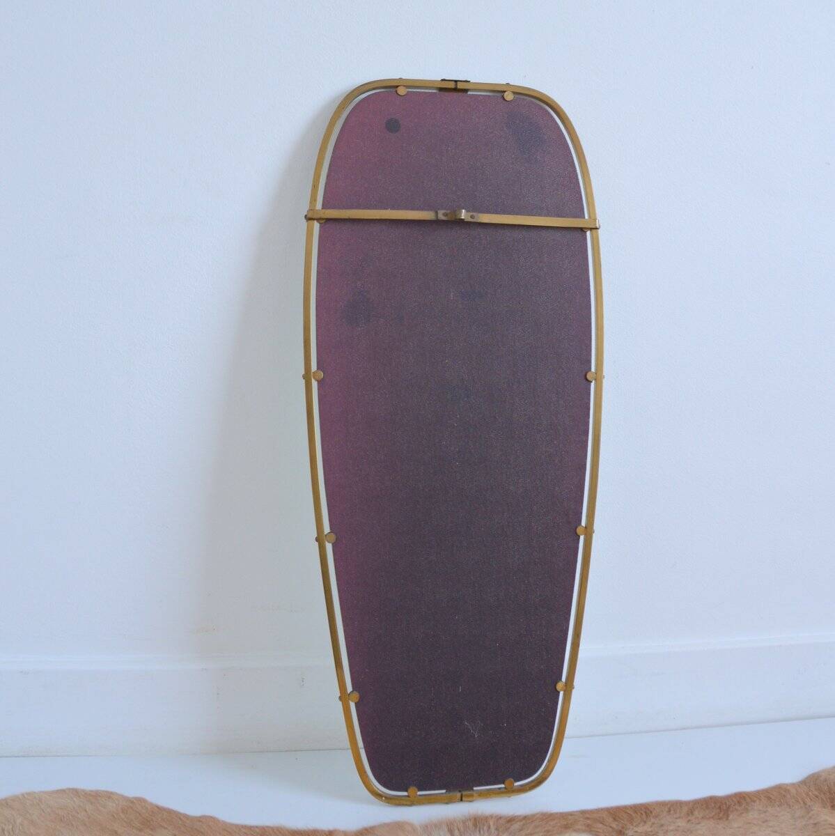 Superb free-form mirror in solid brass from the 50s/60s vintage.