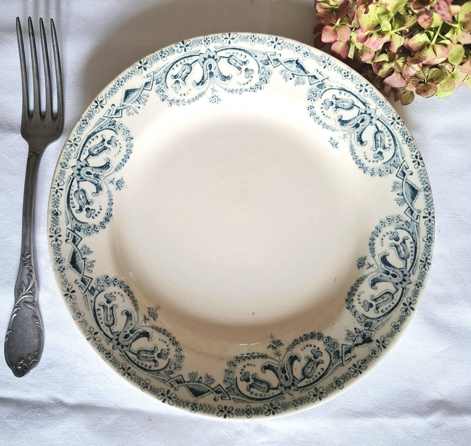 Mismatched antique ironstone dinner plates