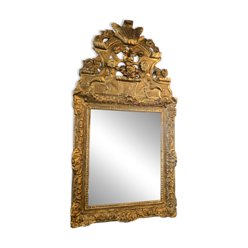 Regency period mirror with a carved and gilded wooden pediment – 18th century