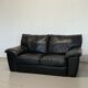 Two-seater black leather sofa — postmodern design
