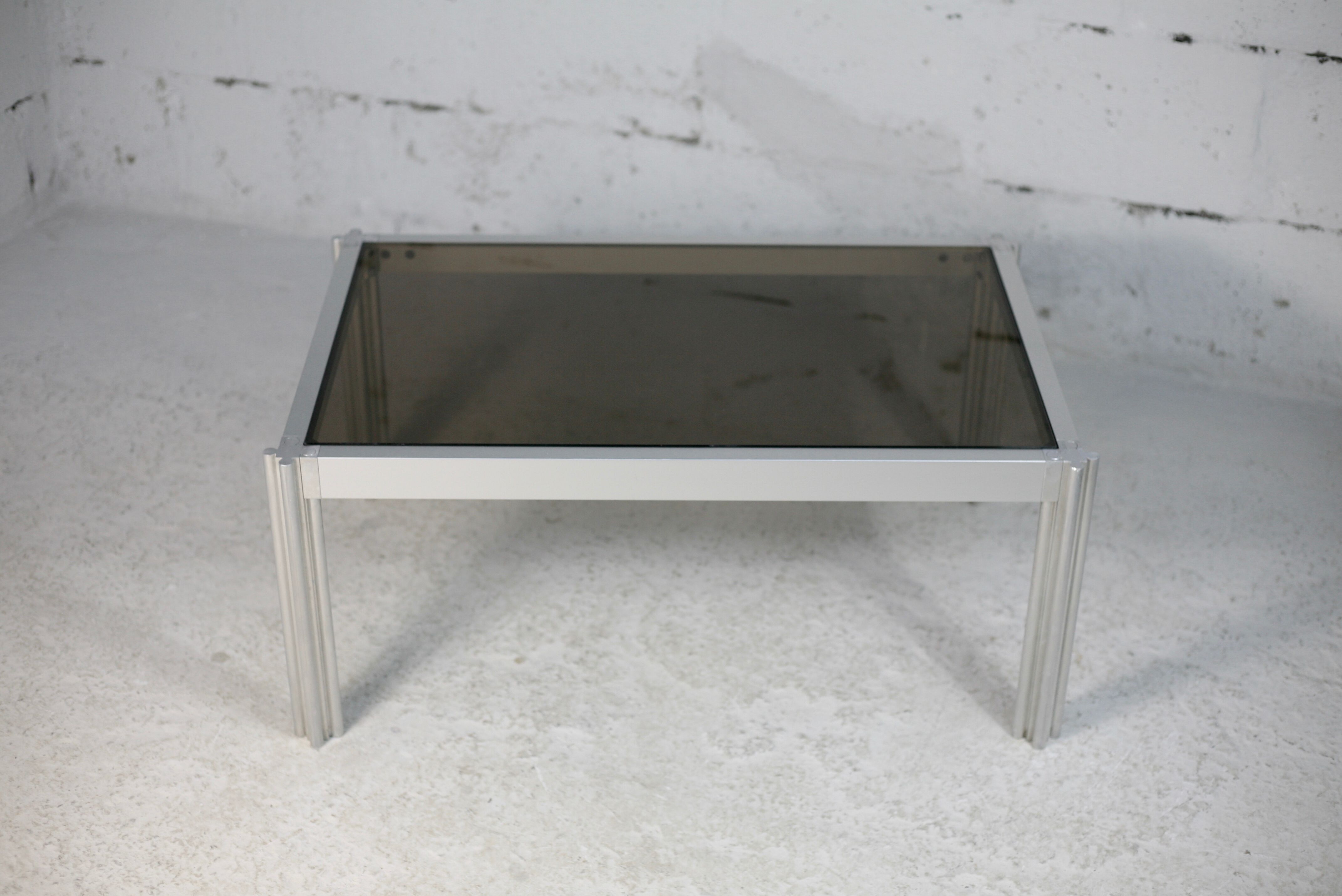 International Furniture. Steel coffee table and smoked glass. Circa 1970