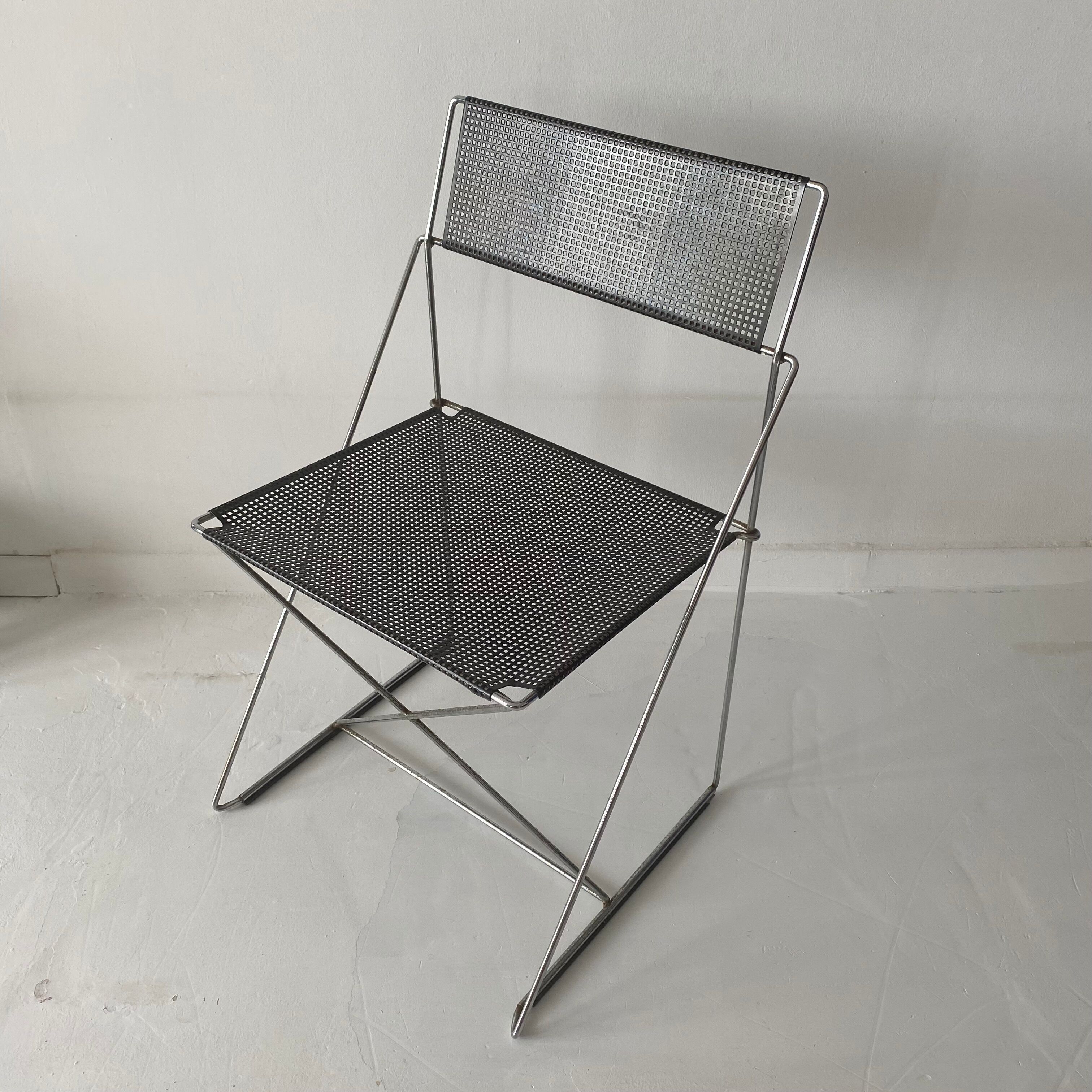 Nuova X line wired chair by Niels Jorgen Haugesen