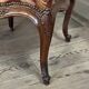 Louis XV armchair in carved walnut, needlepoint tapestry, 18th century