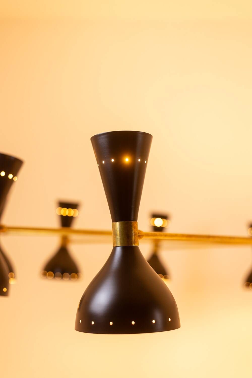 Black lacquered metal 12-arm light chandelier. Contemporary.