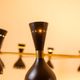 Black lacquered metal 12-arm light chandelier. Contemporary.