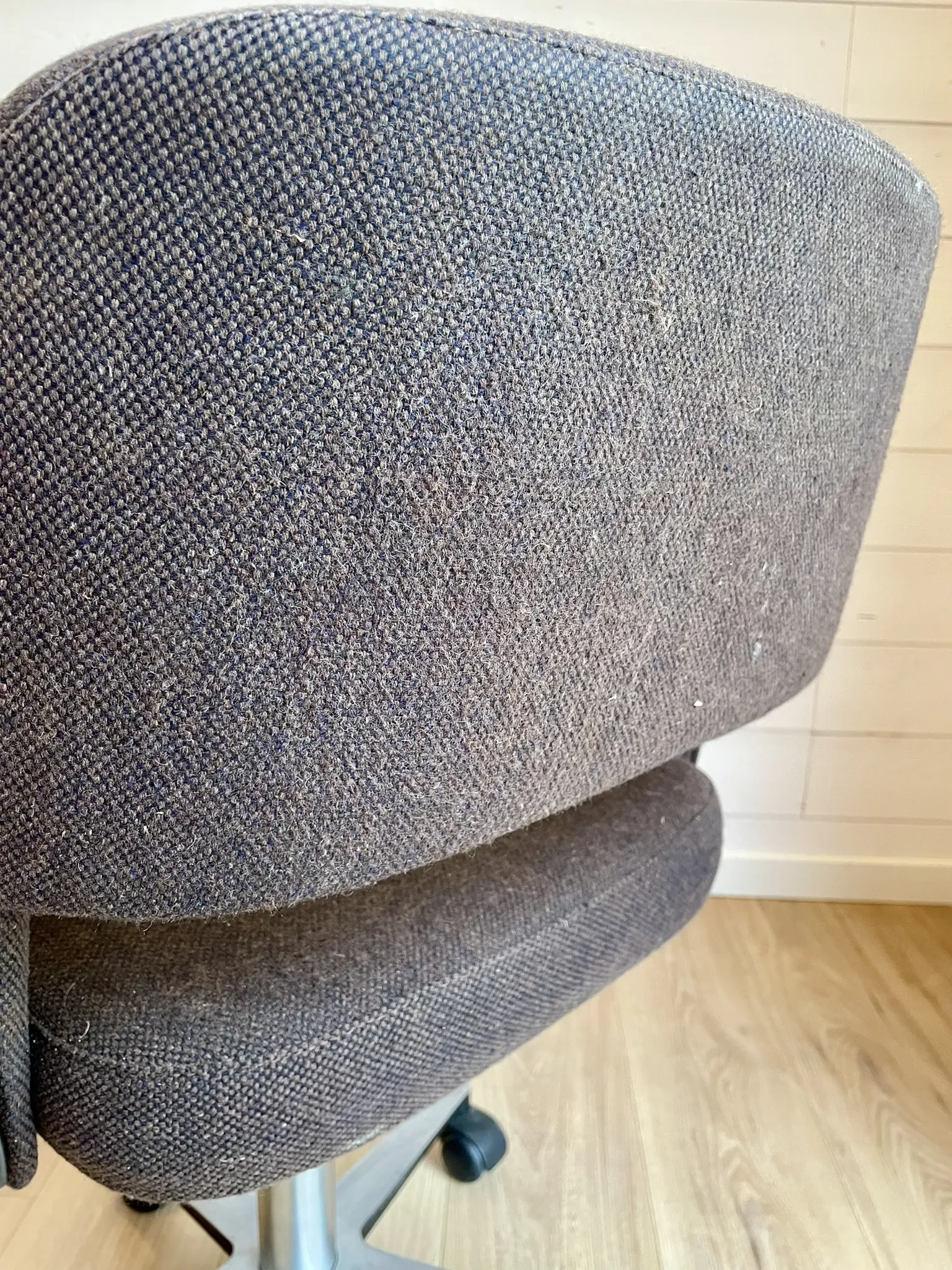 Vintage Mid-Century brown office chair with wheels from the 1970s.