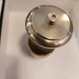 Varnished wood and brushed brass pepper mill