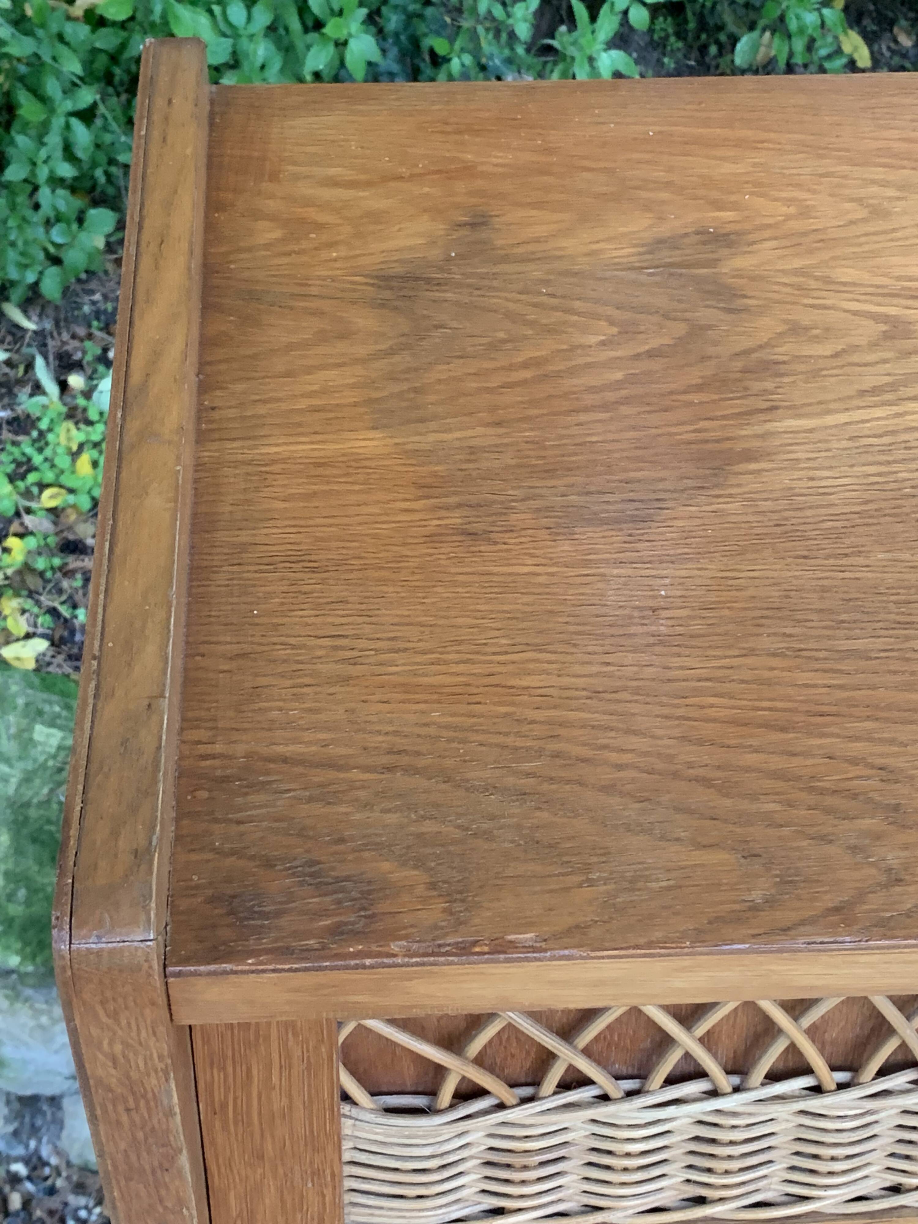 Vintage rattan chiffonier with compass feet 1950