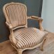 Fauteuil laqué blanc de style Louis XV