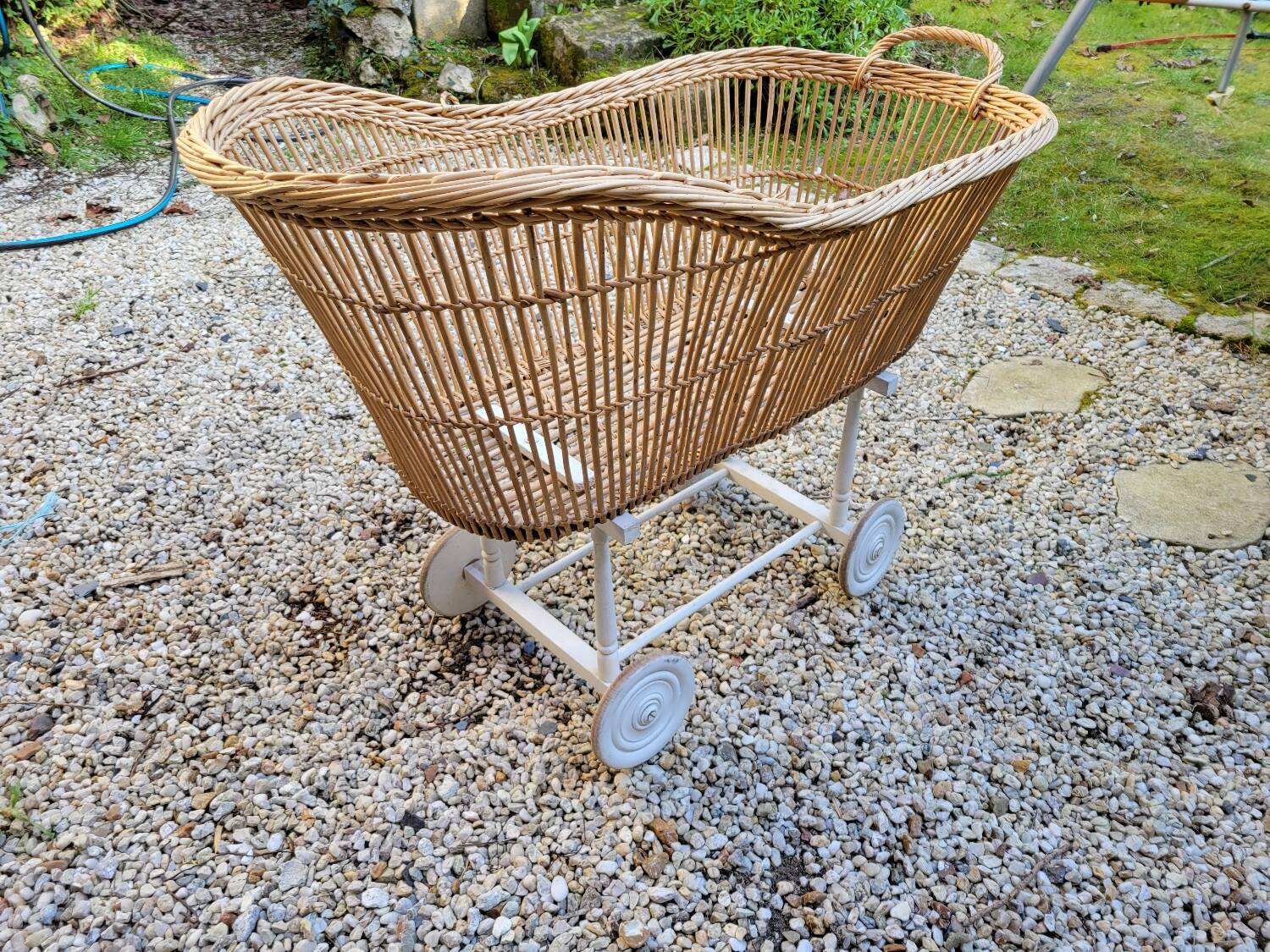 Wicker cradle on wheels, late 19th century