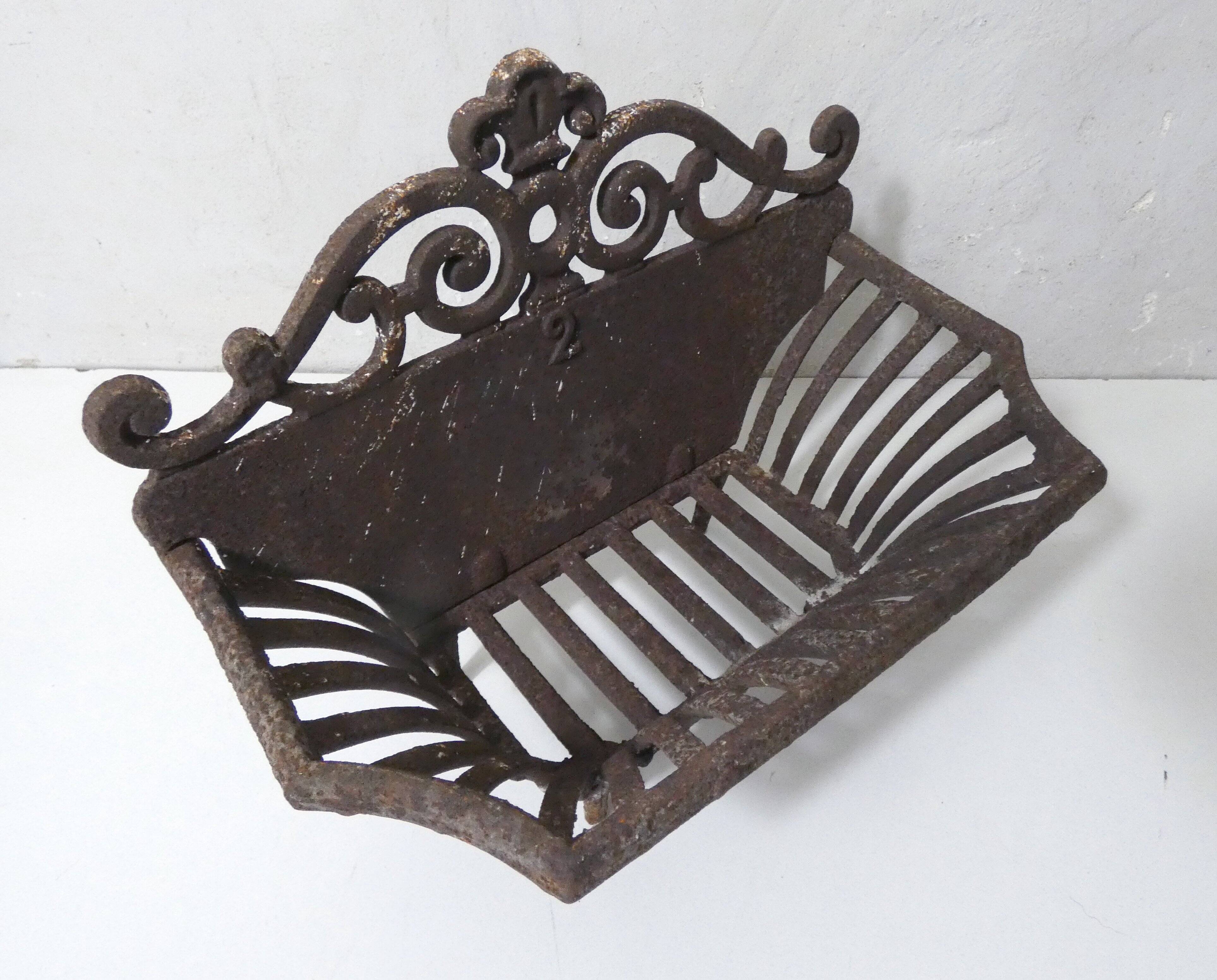 vintage cast iron log holder