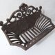 vintage cast iron log holder