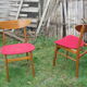 Pair of Scandinavian chairs in teak and red fabric