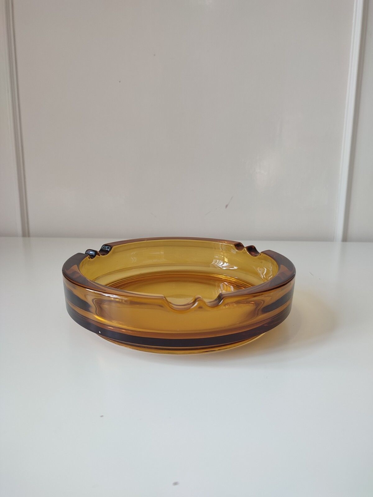 Amber glass ashtray
