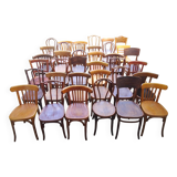 Set of 36 mismatched Bistrot chairs, 1920 to 1950, wooden seats.