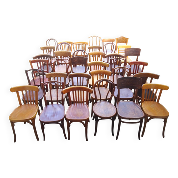 Set of 36 mismatched Bistrot chairs, 1920 to 1950, wooden seats.