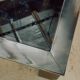 Chrome and glass coffee table.