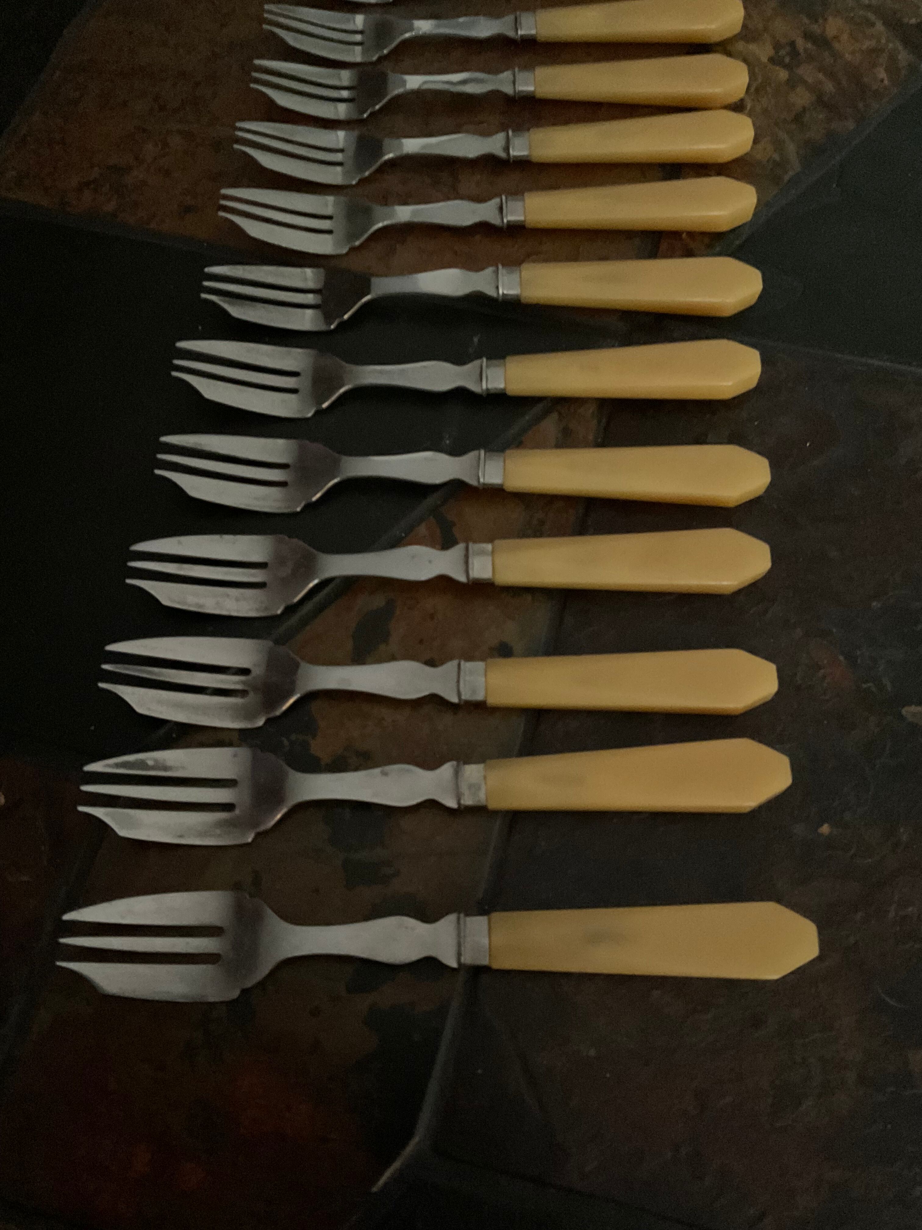 12 .vintage dessert forks
