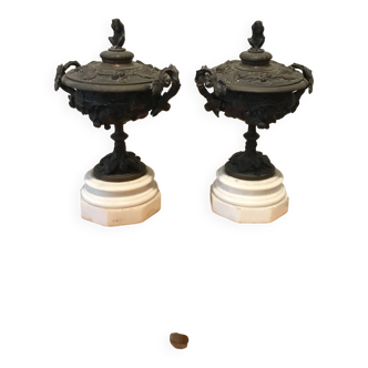 Bronze fireplace garnitures with marble base depicting leaves.