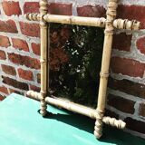 Old mirror in raw wood