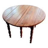 Louis Philippe round table in solid cherry wood, extendable with extensions