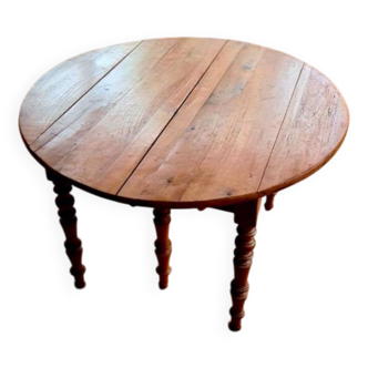Table ronde Louis Philippe en merisier massif extensible avec rallonges