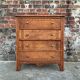 Art Deco commode with wooden top, vintage antique furniture.