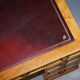 Vintage satin wood partner desk with leather top.