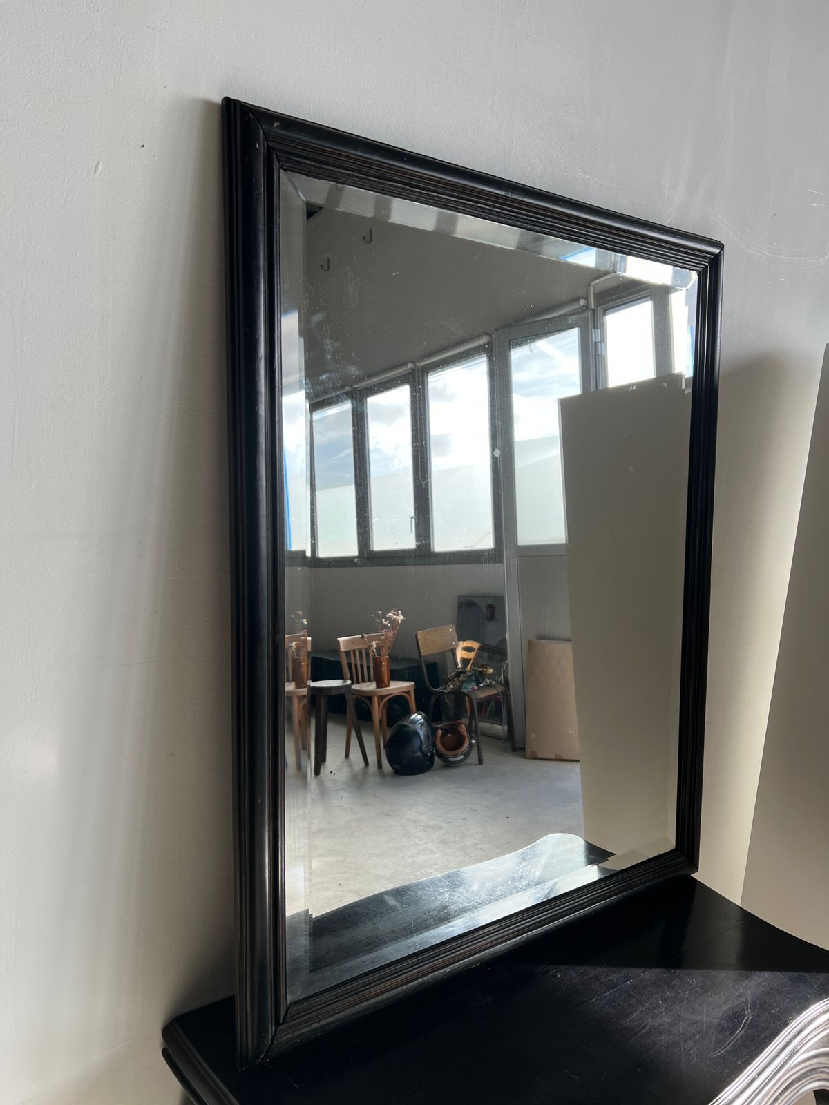 Rectangular mirror in molded blackened wood, beveled glass