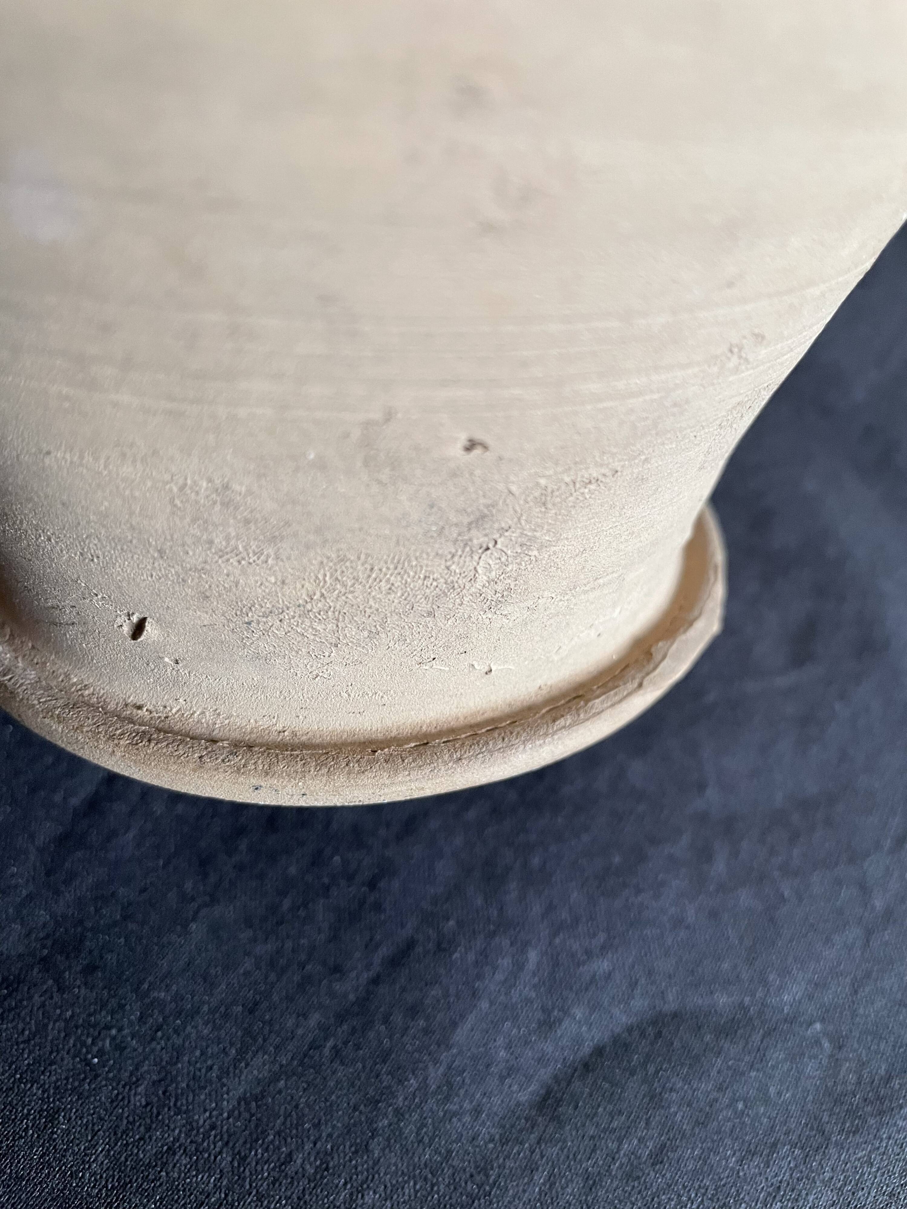 Persimmon glazed terracotta oil jar