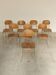 Set of 8 metal and wood school chairs  
Ex Czechoslovakia 1960