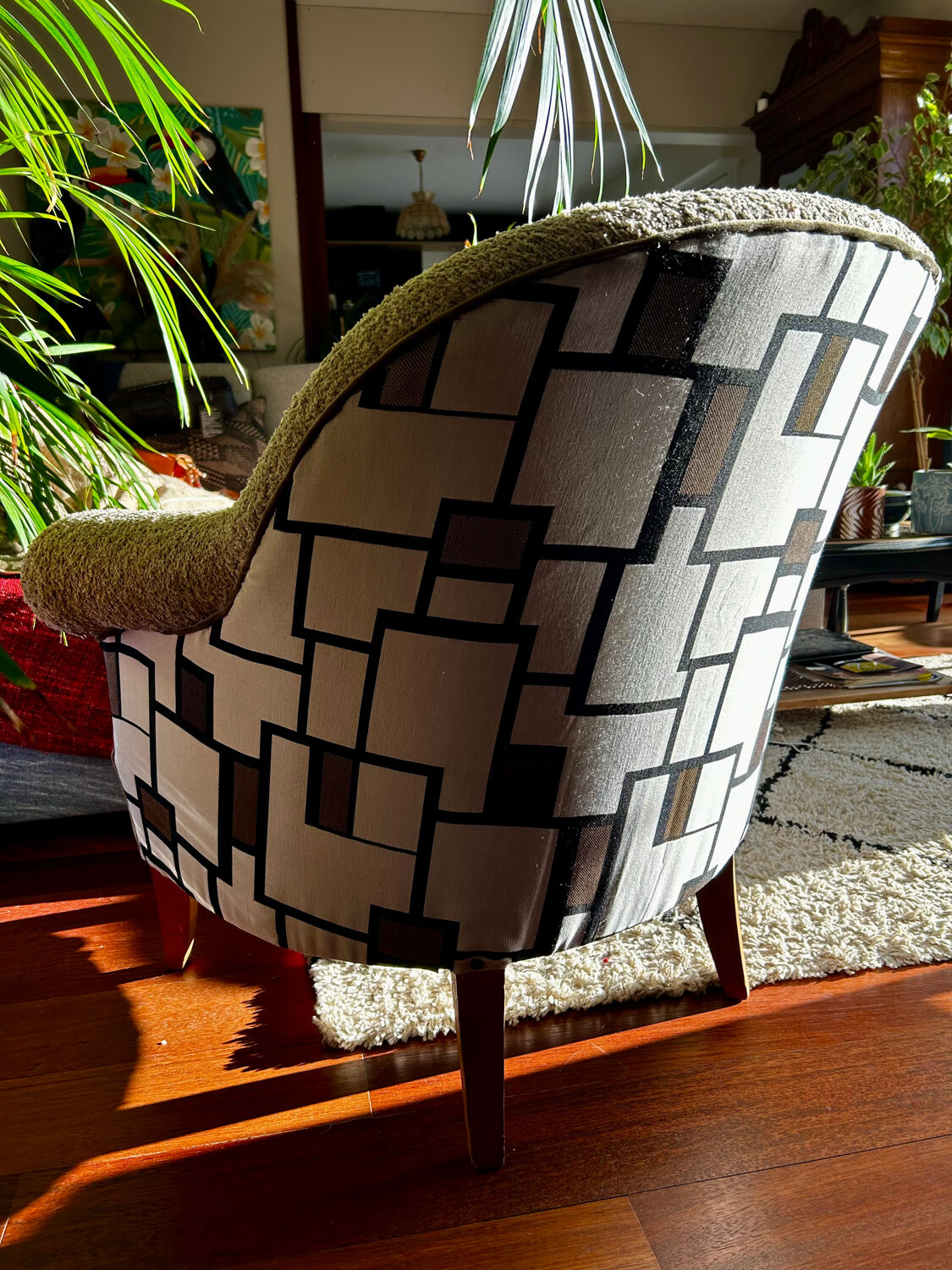 Fully restored beige and graphic armchair.