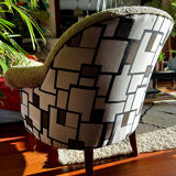 Fully restored beige and graphic armchair.