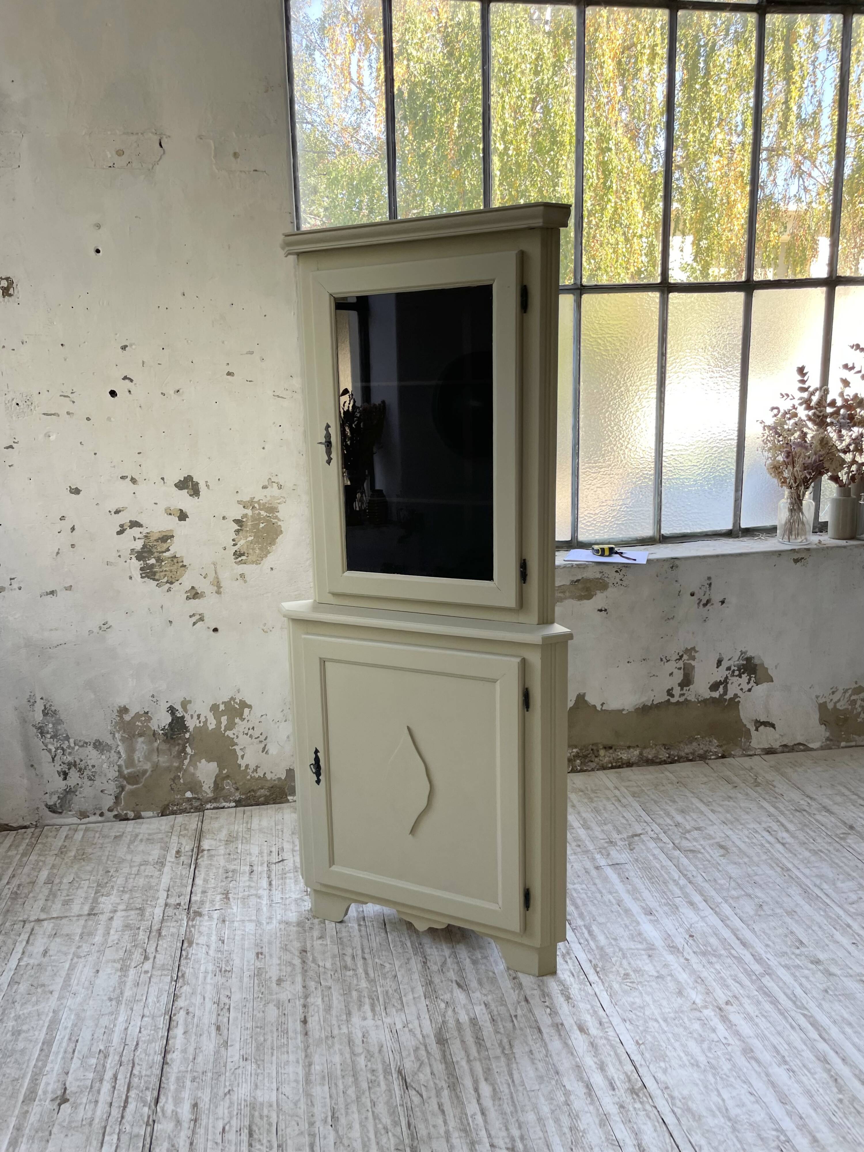 Corner display cabinet from the 1950s