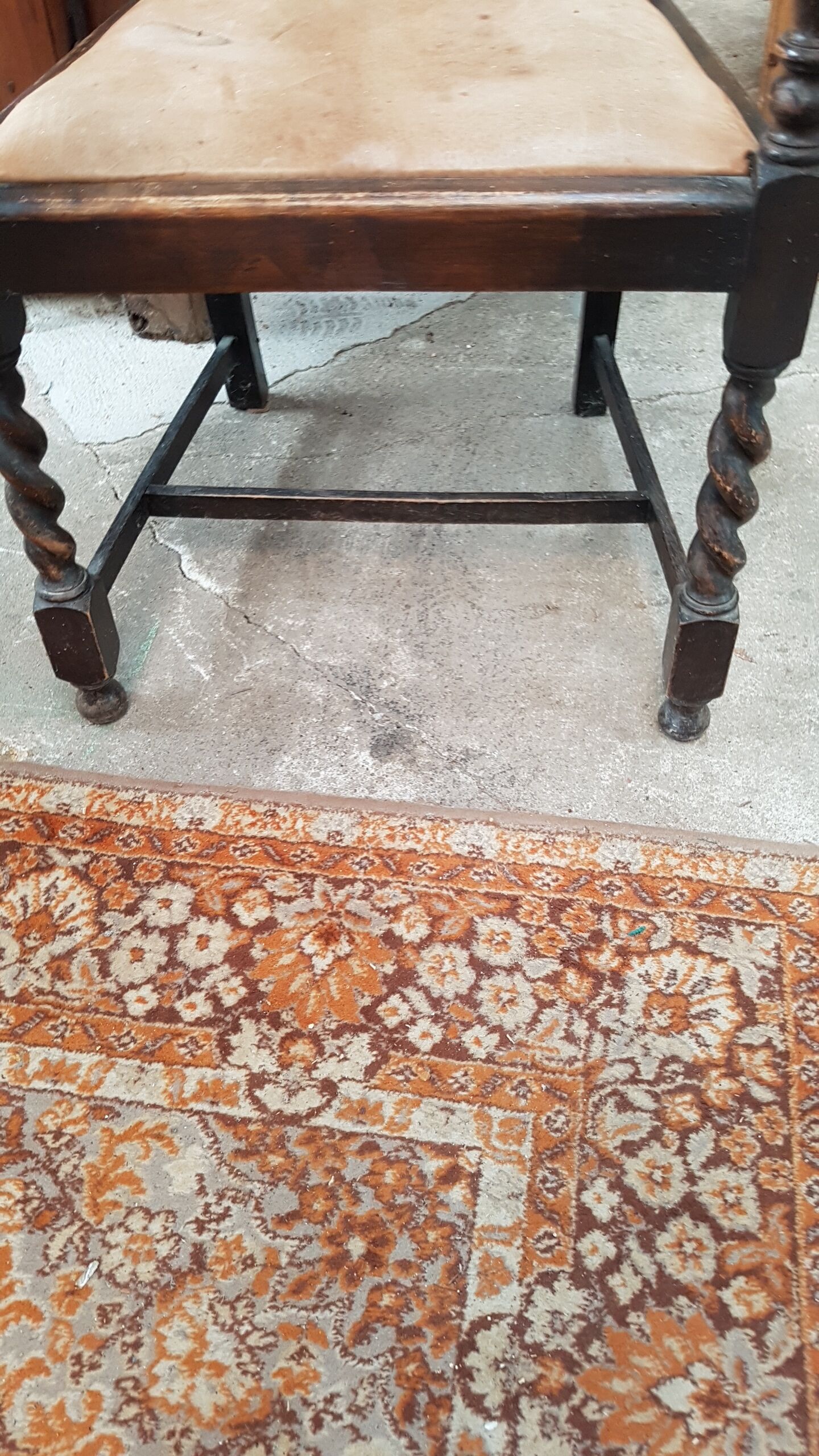 Solid oak and leather armchair