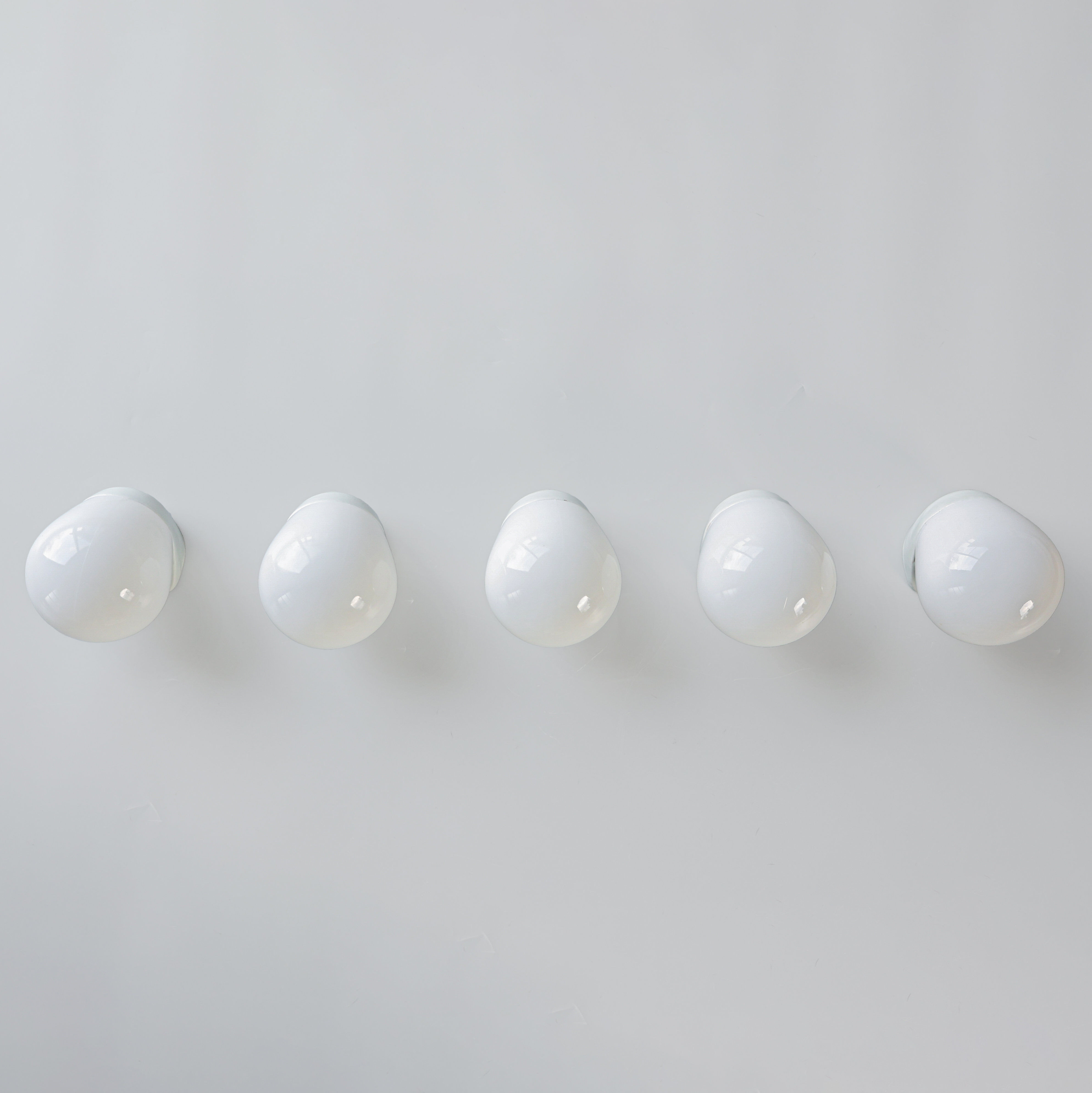 Wilhelm Wagenfeld, ceiling lights, porcelain, 1950s.