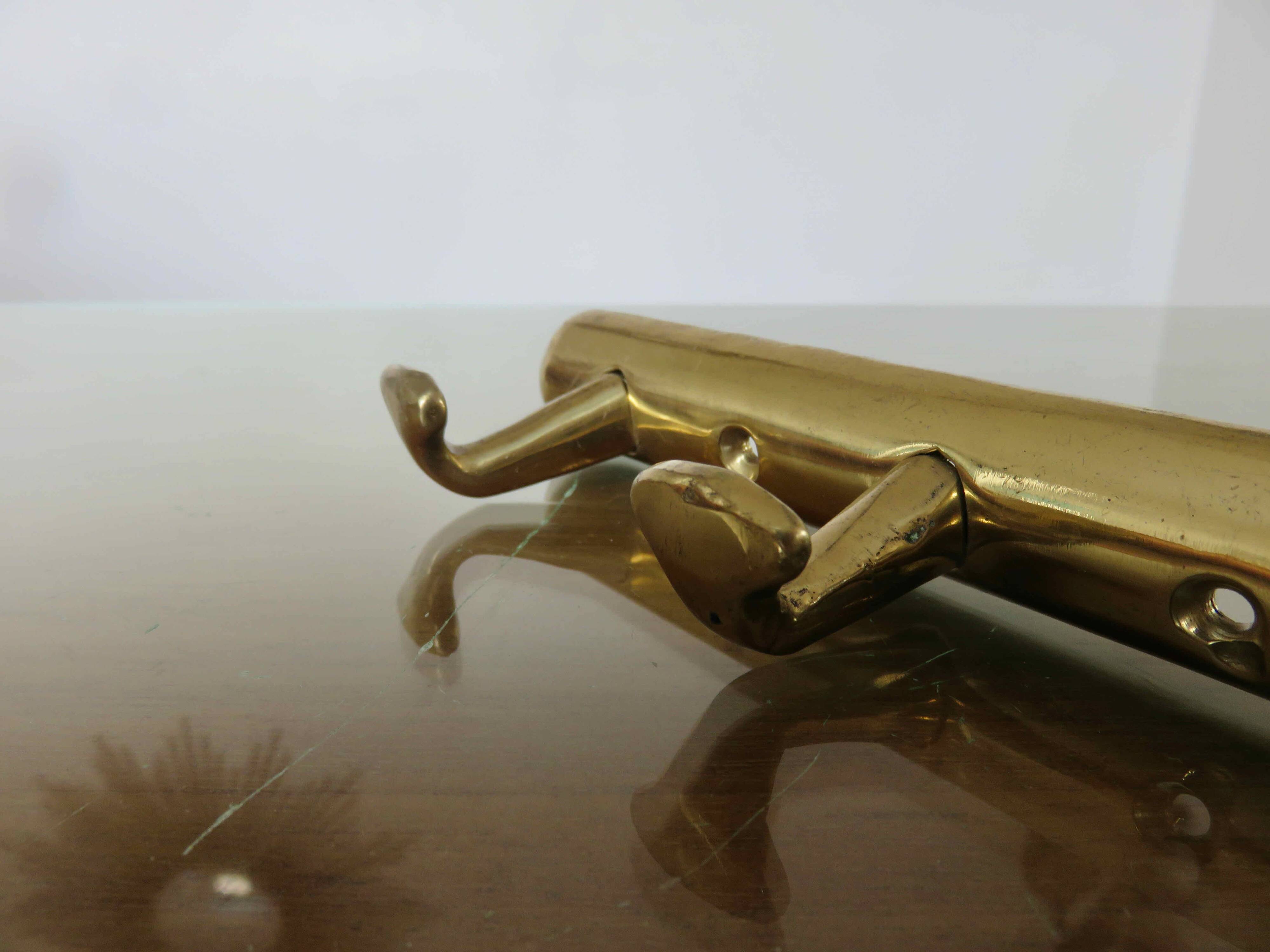 Brass tea towel holder