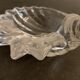 Empty crystal pocket in the shape of a shell