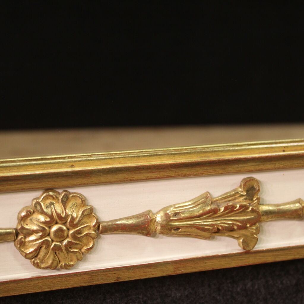 Lacquered and gilded mirror in Louis XVI style