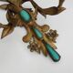 Pair of gold metal wall lights with turquoise glass inlay. 70