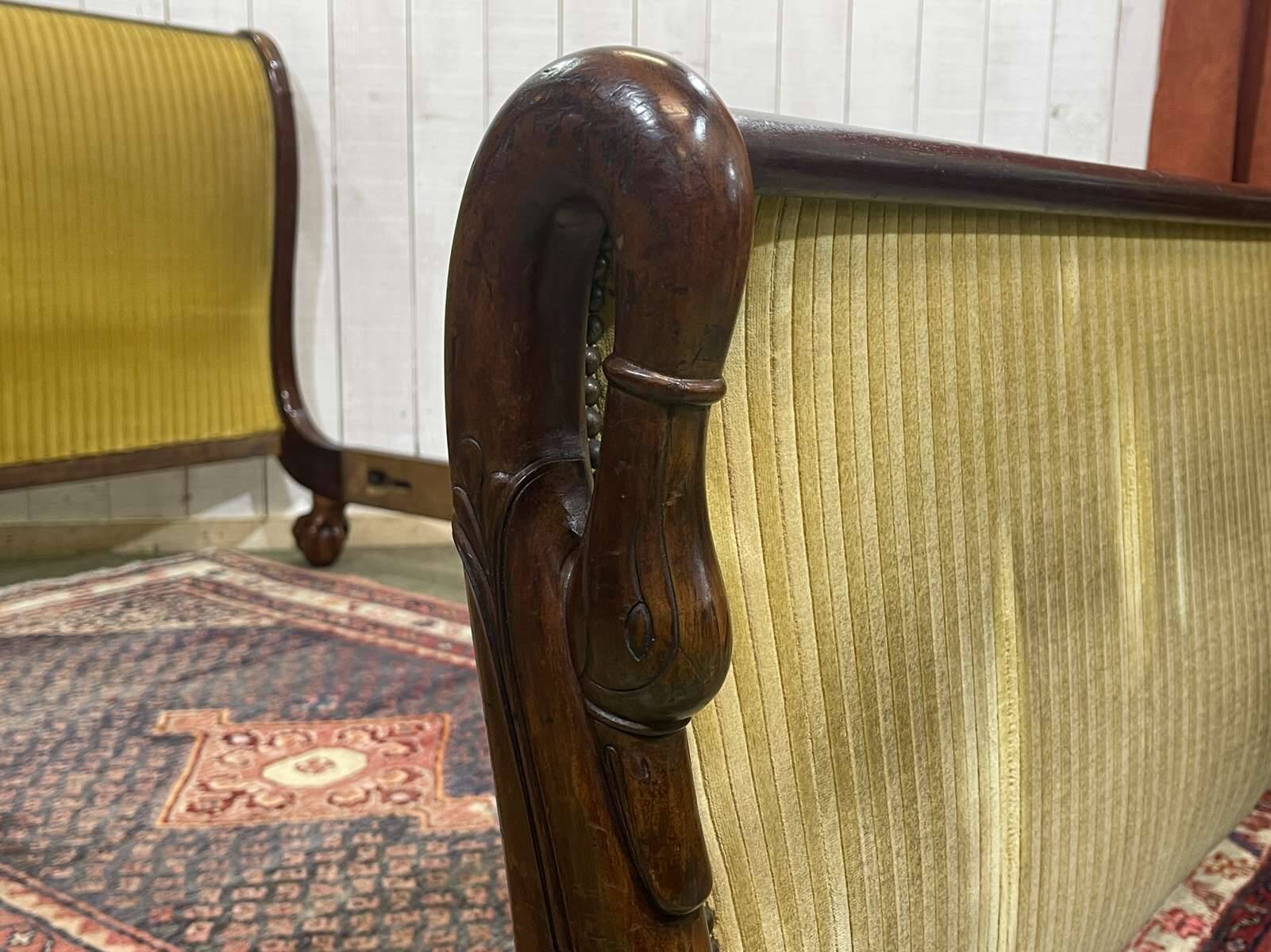 Early 19th century Empire mahogany bed with swan neck finials and claw feet