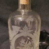 Flacon en verre gravé