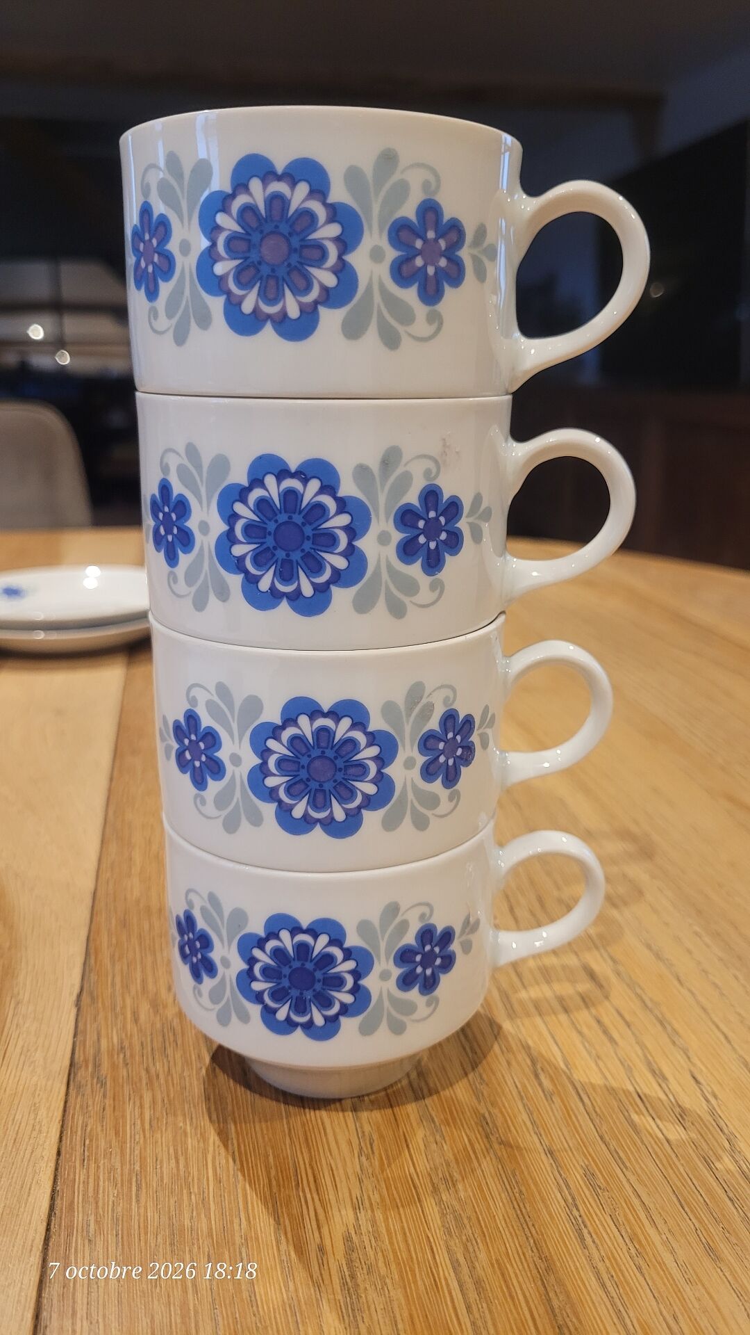 4 vintage coffee cups and their saucers